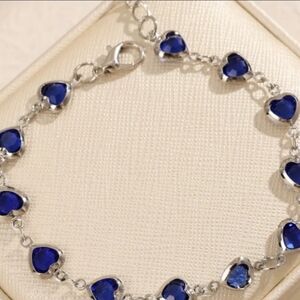 Heart Charm Silver Tone And Blue Bracelet